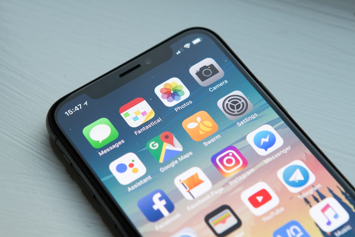 Smartphones displaying mobile app interfaces